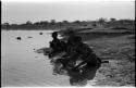 Three women bathing in Nama Pan