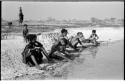 Women and girls bathing