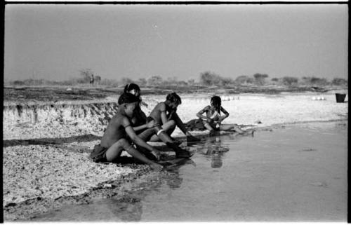 Women and girls at the edge of Nama Pan