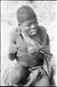 Man working on a cord for sewing