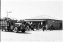 Trucks drawn up at Craille's trading post at Ghanzi