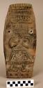 Ceramic plaque, human figure in relief, incised design, perforations