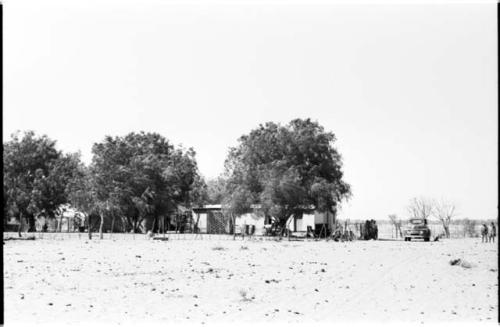 Farm building and trees from a distance