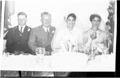 Theunis Berger and Marguerita Ammann at their wedding, accompanied by a bridesmaid and a groomsman