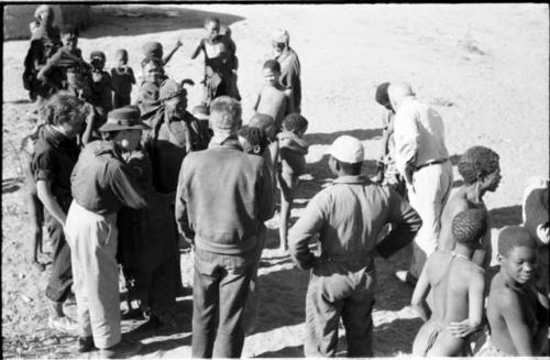 Expedition members greeted by a group of Ju/'hoansi