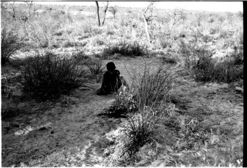 Child sitting on ground