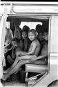 Boys sitting inside Land Rover