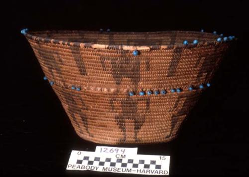 Large basket with turquoise bead decoration