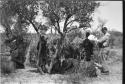 Group of women performing a menstruation ceremony, an expedition member to the side recording sound