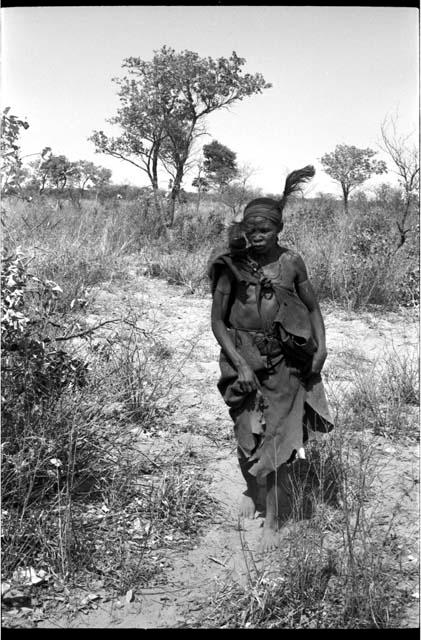 Woman walking, part of a menstruation ceremony