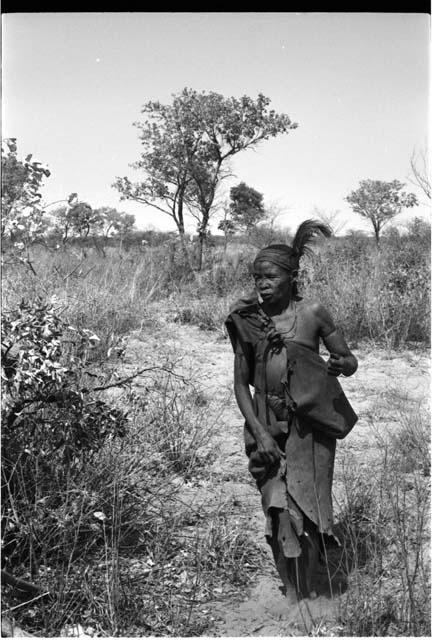 Woman walking, part of a menstruation ceremony