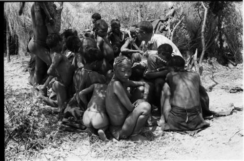 Group of women sitting after the dance, listening to the sound recordings with Nicholas England