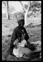 Portrait of an elderly woman sitting