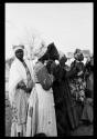 Women standing in a line clapping