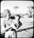 Baby being held by Lorna Marshall (copy of color slide 6E-82)