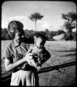 Baby being held by Lorna Marshall (copy of color slide 6E-82)