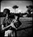 Baby being held by Lorna Marshall (copy of color slide 6E-82)