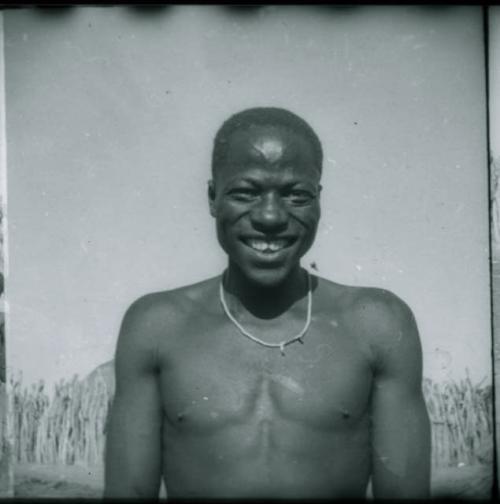 Man showing his filed teeth