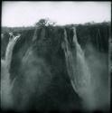 Two sets of jets of Ruacana Falls, with baobab tree between them