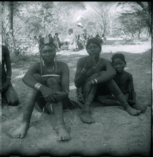 Women and a child sitting