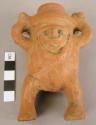 Red Ware effigy of human being carrying a vessel on head