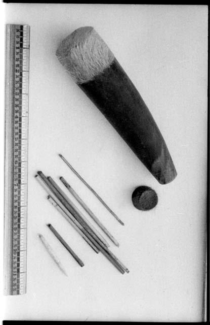 Quiver, most likely made from horn and animal skin, seven arrow shafts, and a ruler for measurement