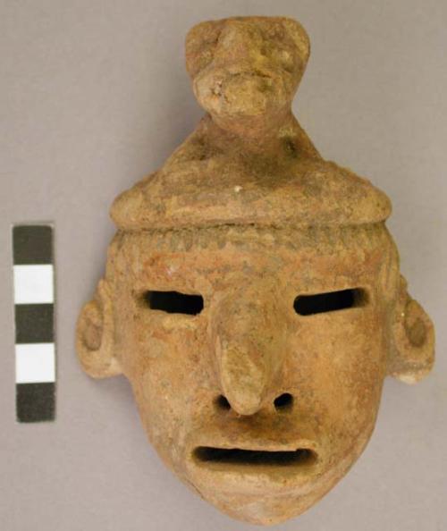 Broken figurine head with "alter ego" from San Ramon