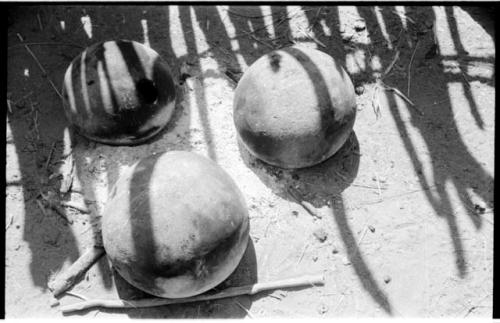 Three round-bottomed clay pots