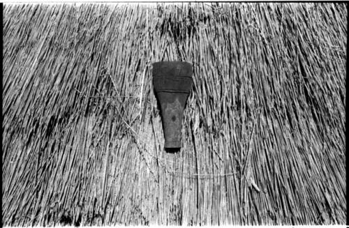 Funnel displayed on a thatched roof