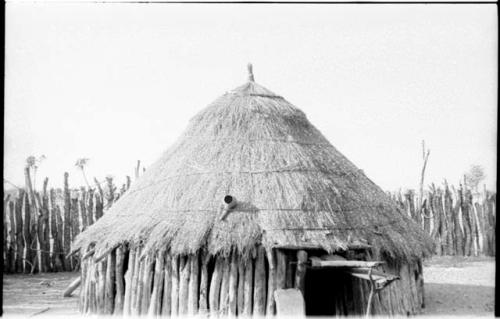 Hut in a Dimba kraal with a thatched roof tied with cord