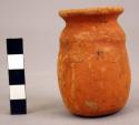 Red ware vessel with traces of black manganese paint