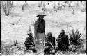 Lorna Marshall standing beside group of unidentified women