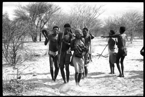 N/kxabe and Tama (N/kxabe's husband), !Kxam, /Gaishay and other men dancing