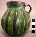 Ceramic green and brown glazed small jug