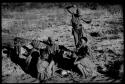 Group of women playing the dandiri; Dadum dancing