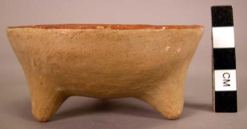 Ceramic tripod bowl with red + brown design of rabbit(?) on inside