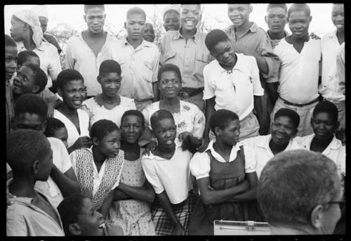 Chorus group listening to Nicholas England's recordings