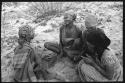 Group of women sitting and playing a dandiri