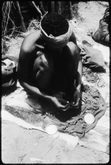 Dadum working on her bead work (copy of color slide 2001.29.8364)