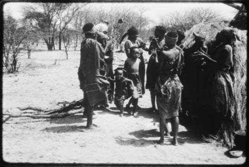 Group of women clapping and singing (copy of color slide 2001.29.8665)