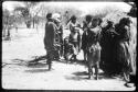 Group of women clapping and singing (copy of color slide 2001.29.8665)