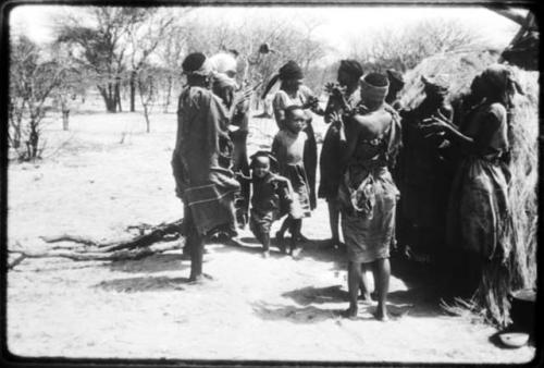 Group of women clapping and singing (copy of color slide 2001.29.8665)