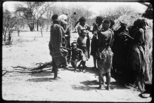 Group of women clapping and singing (copy of color slide 2001.29.8665)