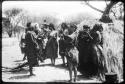 Group of women clapping and singing (copy of color slide 2001.29.8666)