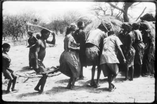 Group of people performing the Eland Dance (copy of color slide 2001.29.8672)