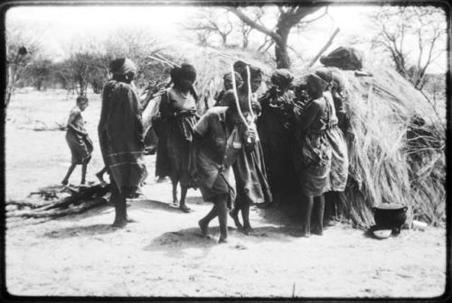 Group of people performing the Eland Dance (copy of color slide 2001.29.8674)