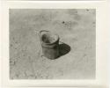 Wooden bucket with a strap (print is a cropped image)