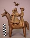 Ceramic "flight into egypt" figurine