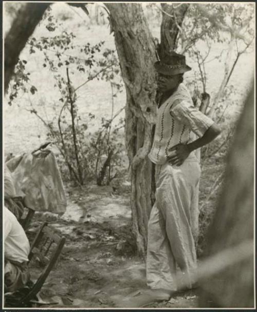 Man wearing a hat, at a meeting between expedition and Isaac Otuhile (print is a cropped image)