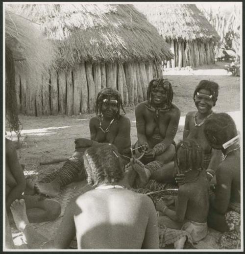 Women sitting inside their kraal